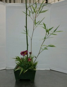 Special Occasion arrangement. Sinobambusa tootsik 'Albostriata' is my bamboo, highlighted with Japanese anemone.